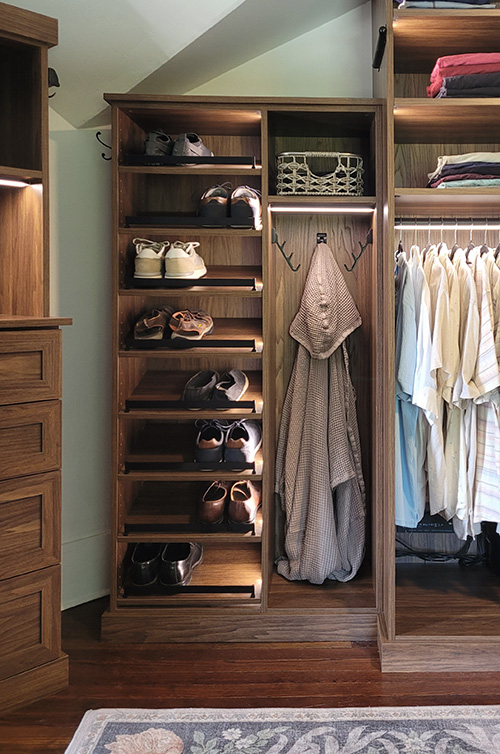 Shared Primary His Closet with Lighted Angled Shoe Shelves with Fences, Valet Rods, Adjustable Shelves & Hanging Space - View More Options