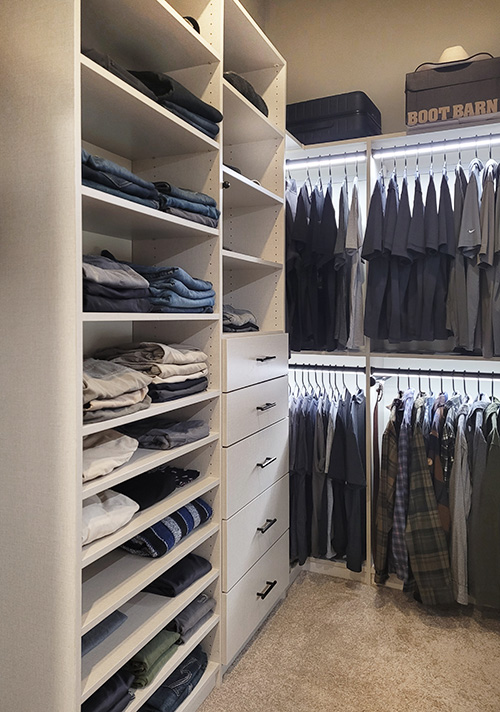 Shared Walk-In Closet with Generous Drawers, Adjustable Shelves and Lighted Garment Rods in Hopewell Junction, NY