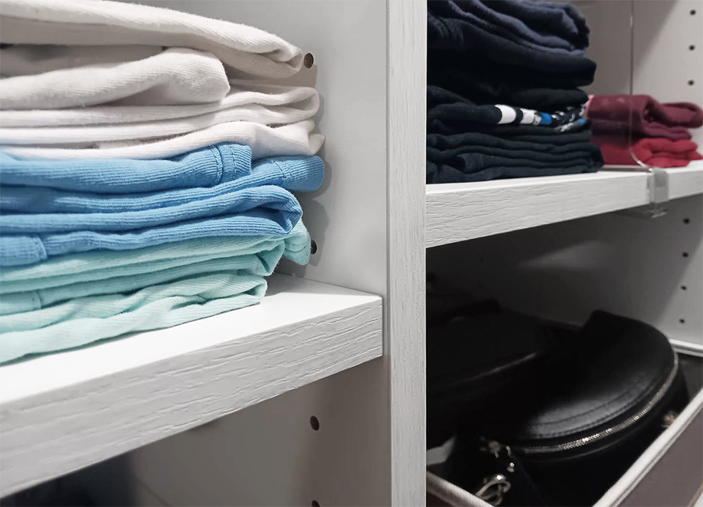 Walk-In Custom Closet Design with Accent Shelf Edge Contrast to White Shelving