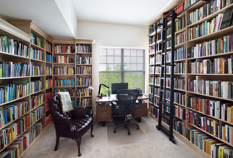 Home Library with Upper Shelves and Ladder