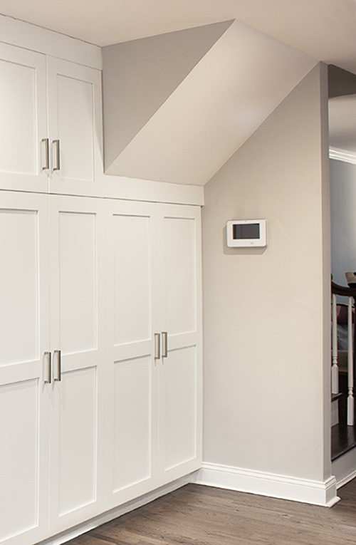 Kitchen Pantry Built-In with Angled Ceiling