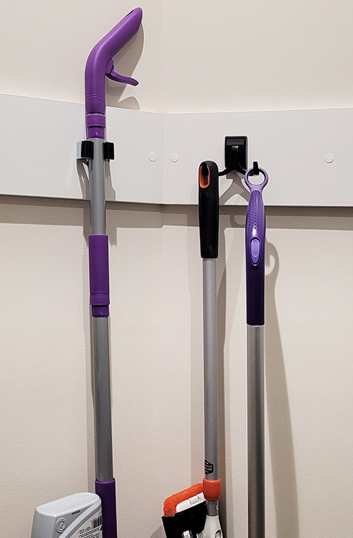 Utility Closet with Cleaning Tools Rack