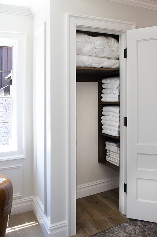 Custom Linen Closet with Brown Halifax Oak Adjustable Shelves in Wallkill, NY
