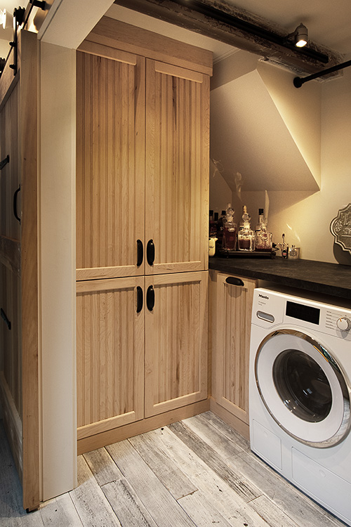 Custom Floor to Ceiling Maple Laundry Cabinets in Woodtsock, NY