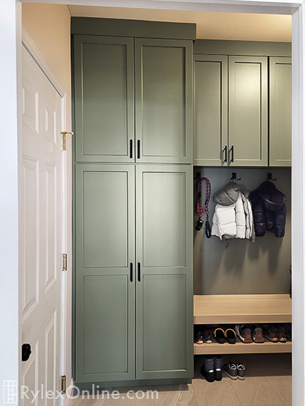 Floor to Ceiling Laundry Cabinets with Shoe Bench