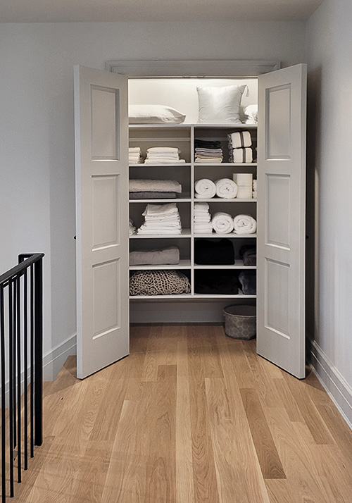 Hallway Linen Closet with Adjustable Shelves