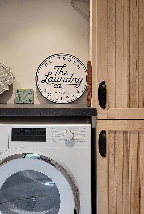 Heritage Home with Modern Laundry Room Cabinets