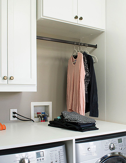 Drying Rod Above Washer and Dryer