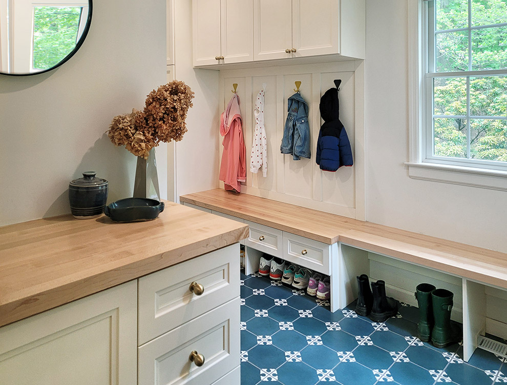 Inviting Mudroom Shoe Bench with Drawers and Maple Countertop