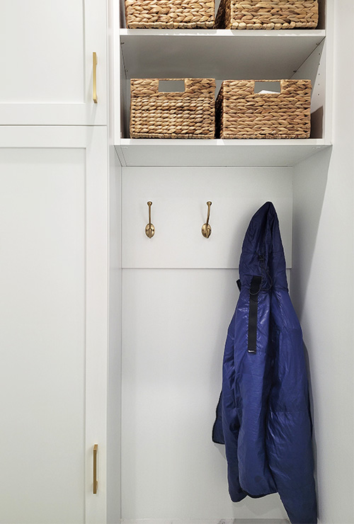 Mudroom White Cabinets with Open Adjustable Shelves and Coat Rack