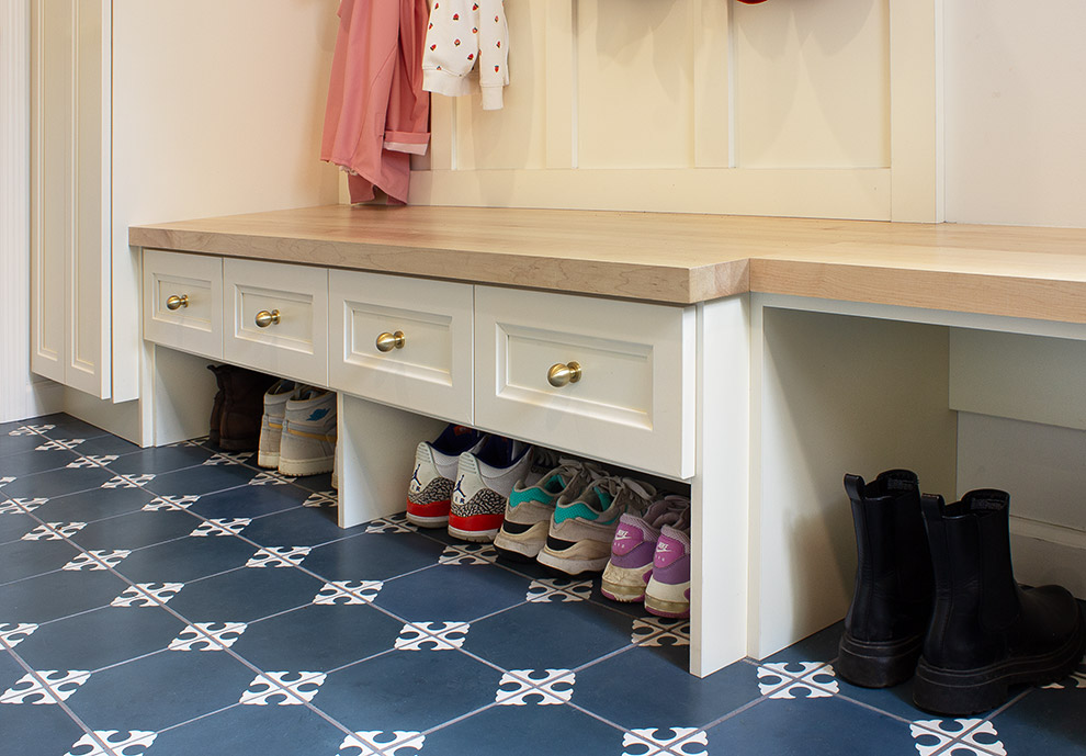 Inviting Mudroom Shoe Bench with Drawers and Maple Countertop