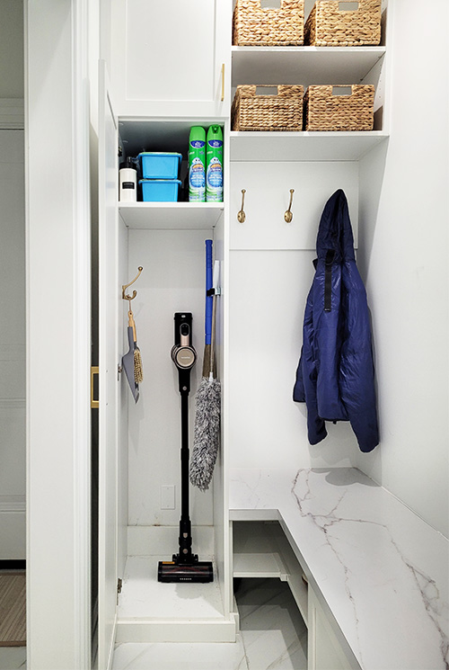 White Mudroom with Tall Utility Cabinet and Open Shelves with Baskets