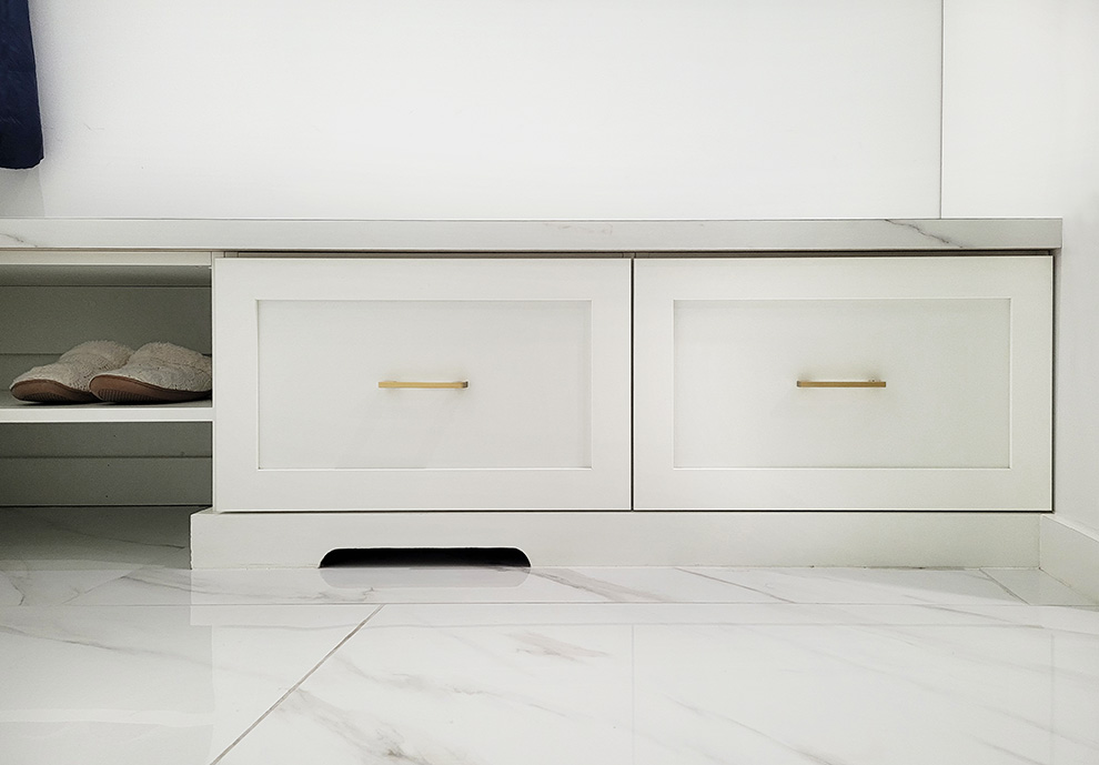 Efficient Mudroom Bench with White Drawers and Gold Hardware