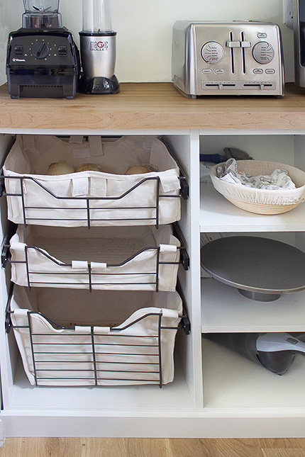 Sliding Baskets and Pantry with Butcher Block Countertop