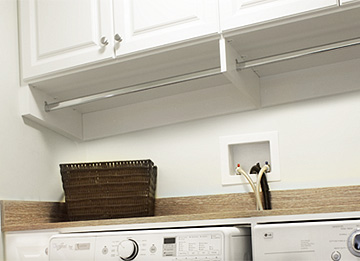 Compact Laundry Cabinets with Hanging Rods