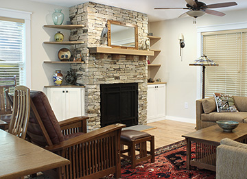 Fireplace Bookcases and Corner Cabinet with Angled Shelves