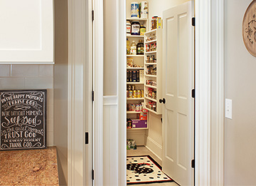 Walk-In Pantry with Sliding Baskets and Wall Spice Rack