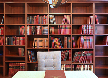 Study with Floor to Ceiling Library Shelving